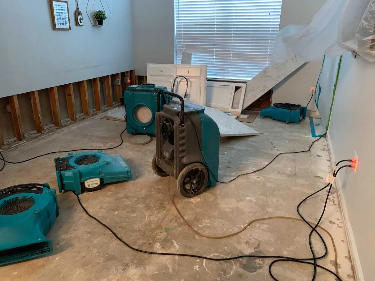 Dehumidifier in flood-cut room for Water Damage Restoration in Harrison